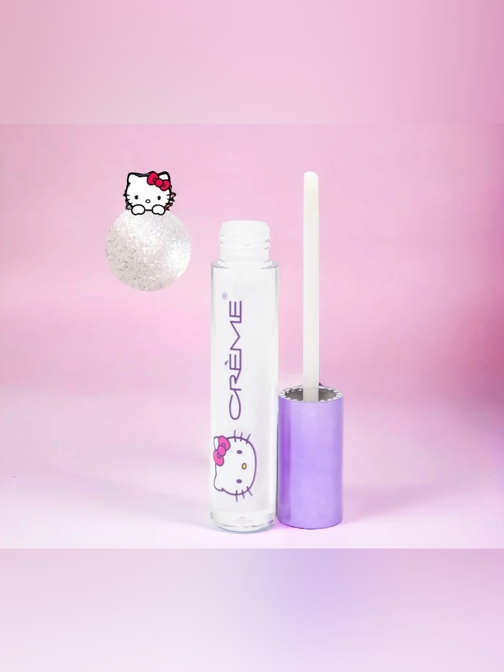 (1) Crème Hello Kitty Clear Lip Gloss — White Shimmer
